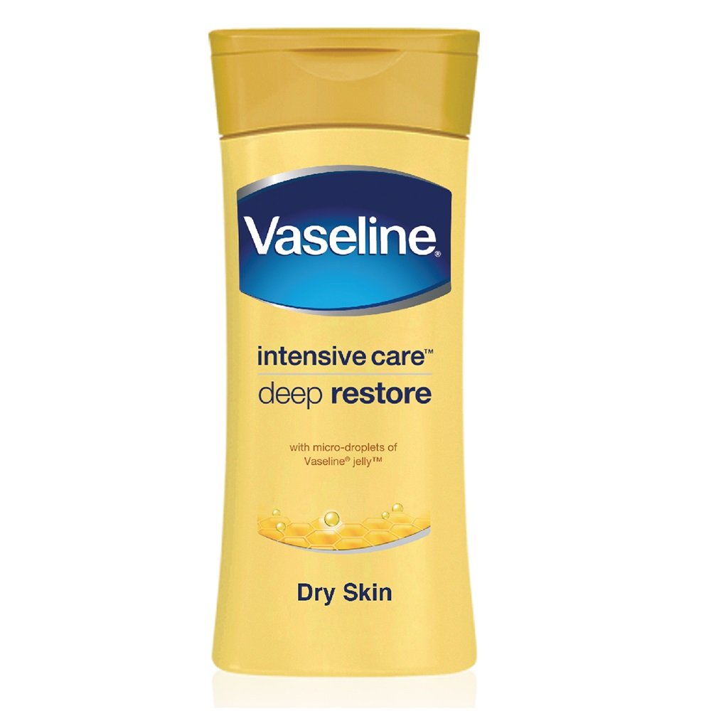 Vaseline intensive care deep restore lotion bottle on a white background