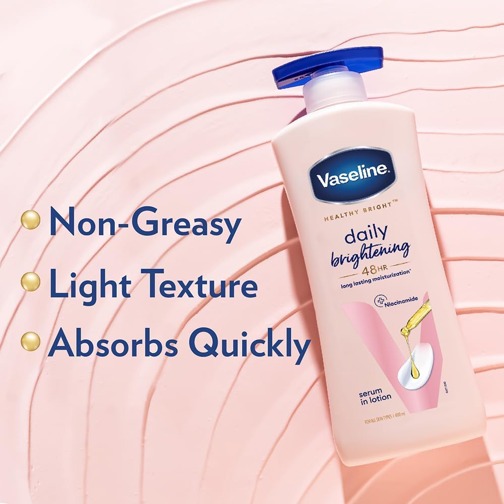 Vaseline body lotion bottle on a pink background with product features listed.
